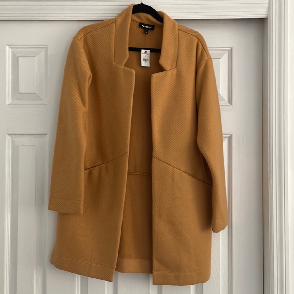 Ladies long  tan color jacket looks great with jeans or dress pants